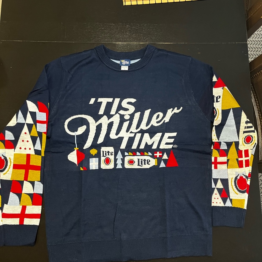 This sweater is the Ugly sweater by Miller Lite Co. 2022